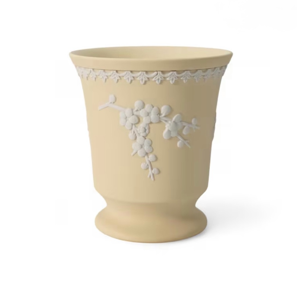 Wedgwood Jasperware vase in primrose yellow with white detail.